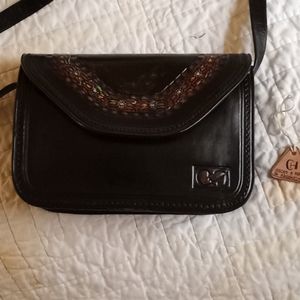 Handcrafted leather crossover handbag